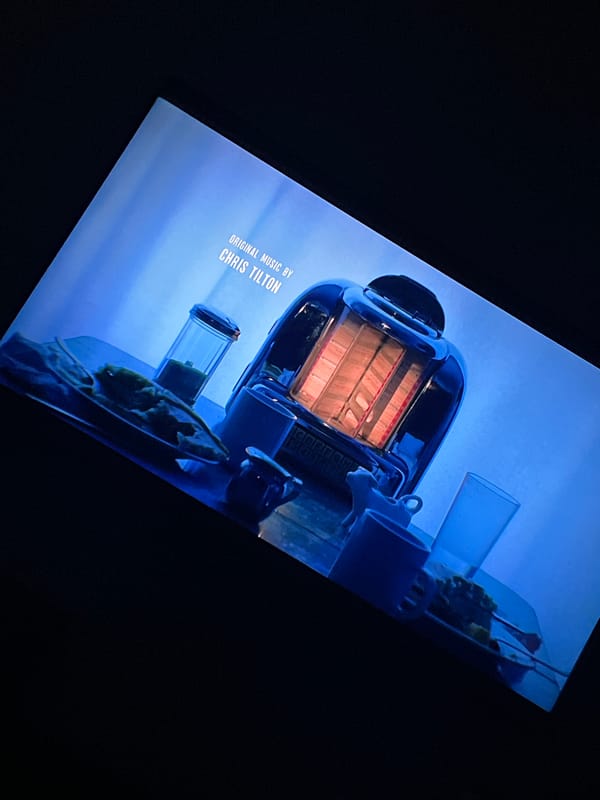 Movie end credits scene shows miniature table setting