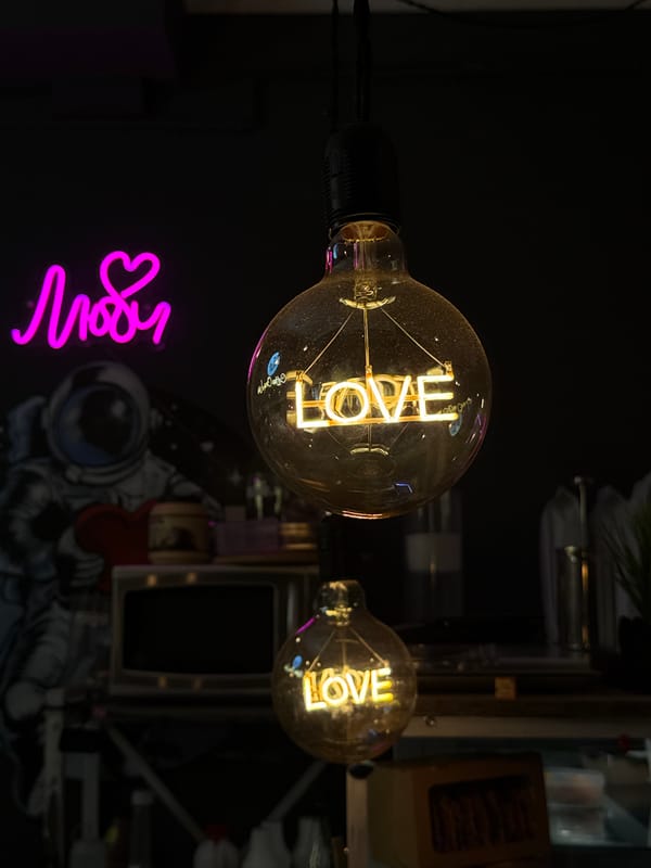 Inside a moody Moscow café with neon-lit Edison bulbs and espresso