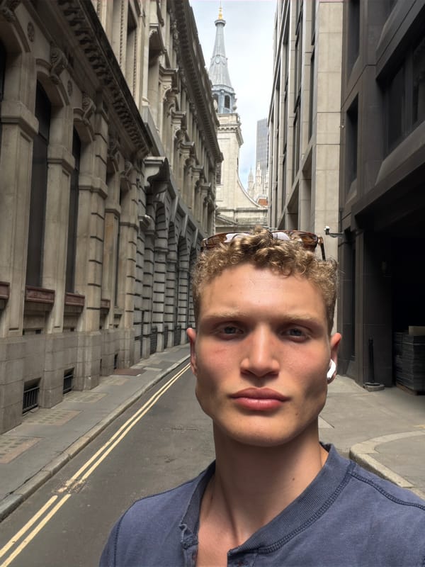 Quick photo series on a London street, blue shirt and sunglasses.