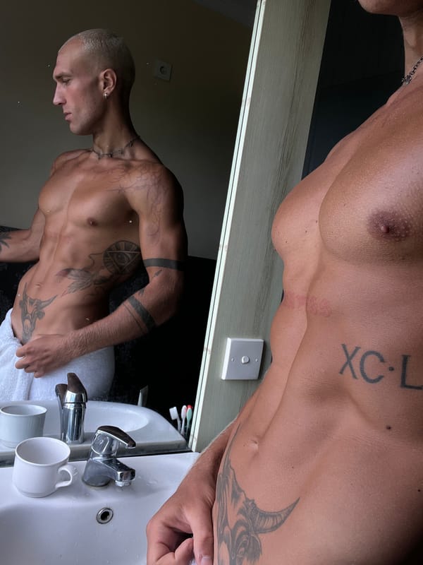 Tattoo selfie session in a North Kuta hotel room