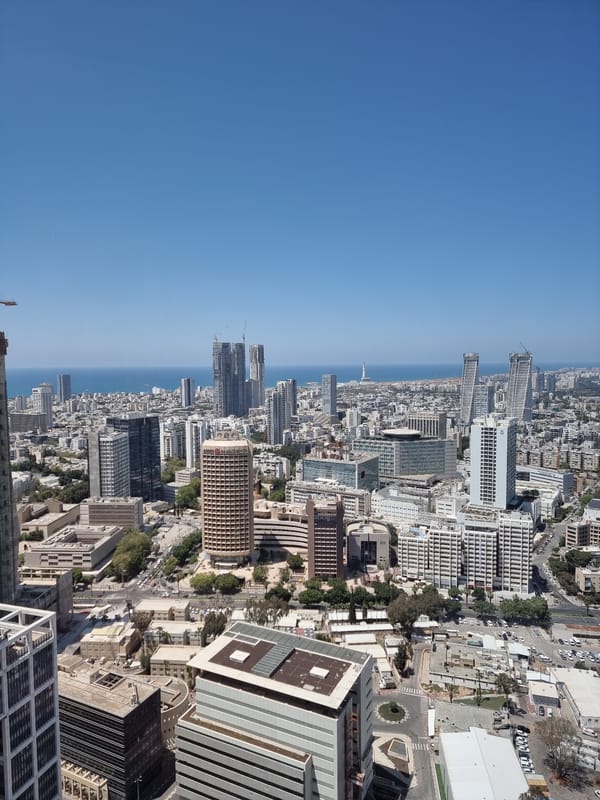 Coastal city aerial views and ride-sharing imagery captured in Jordan