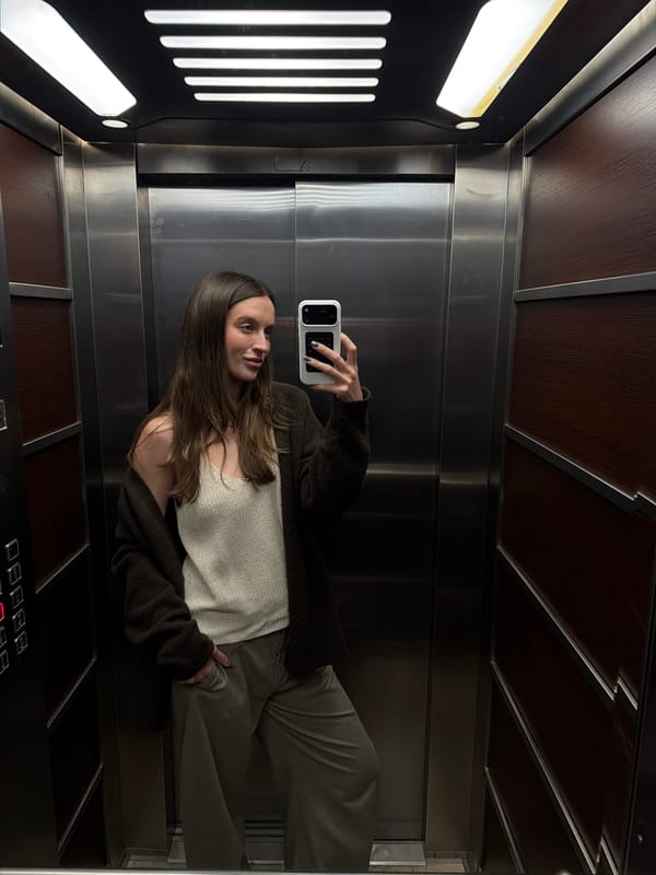 Woman Takes Selfie in Elevator in Budva, Montenegro