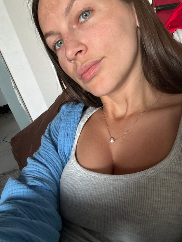 Woman takes multiple selfies in Fredenbeck, Germany