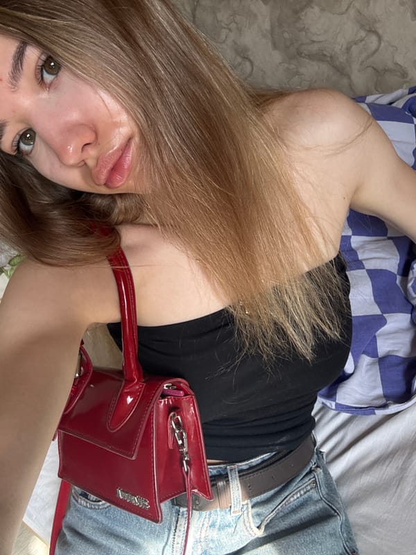 Woman takes mirror selfies in residential space, Noviy Russia