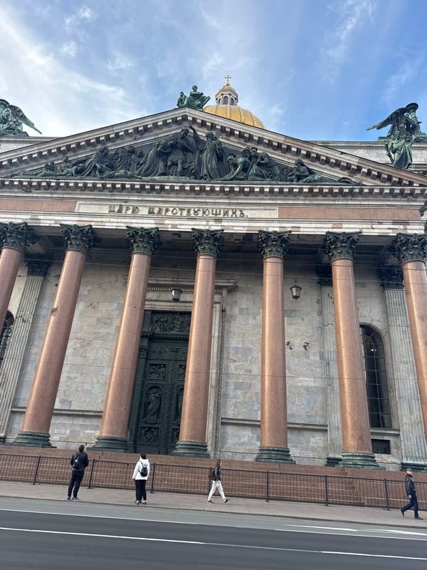 Tourist documents St. Isaac's Cathedral golden dome in Saint Petersburg