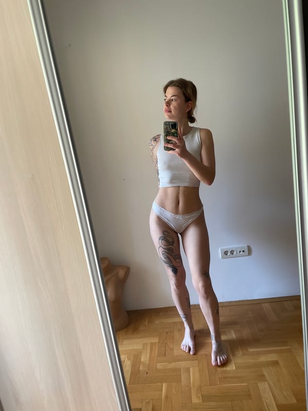 Woman takes mirror selfie in Boreti, Montenegro