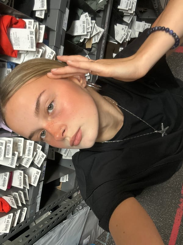 Employee photographed with RFID scanner in Whistler retail location