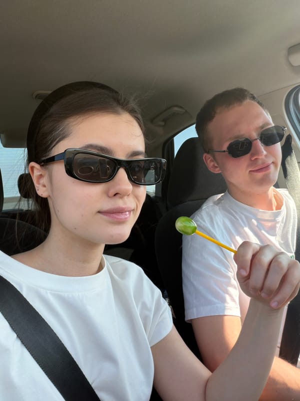 Two travelers drive through Russian countryside near Перевозное