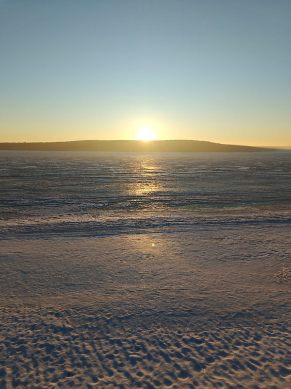 Early morning winter walk documented along Kama River in Chaikovsky