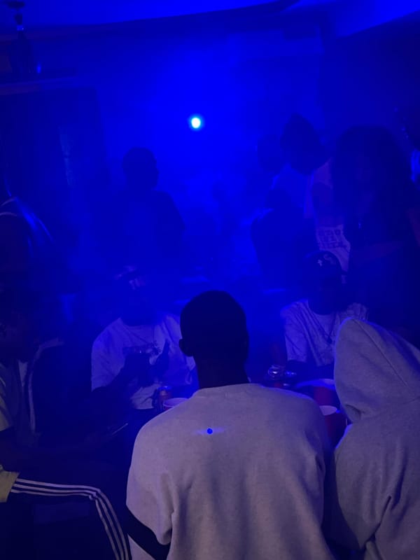 Night out at a blue-lit club in Durumi, Nigeria