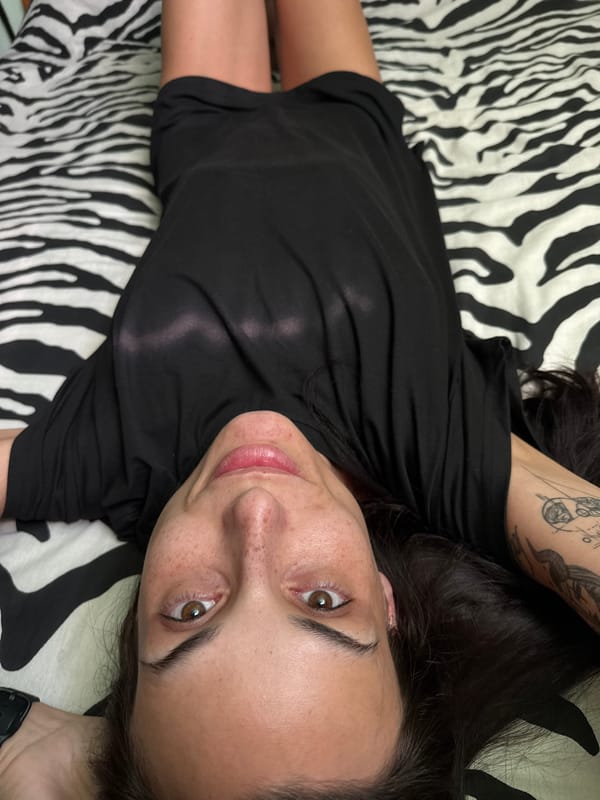 Woman rests on zebra bedding in Pleven, Bulgaria