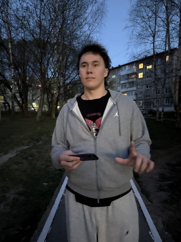 Young man spotted with phone outside building in Perm