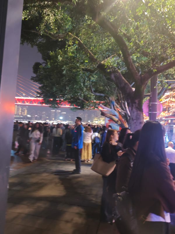 Tourist documents morning scenes across central Chongqing district