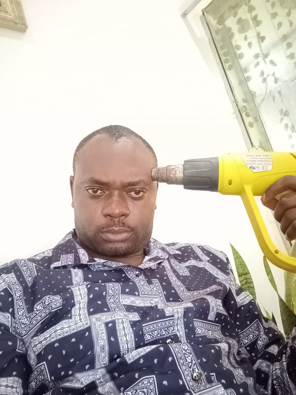 Man observed with tool in Gwarinpa office setting