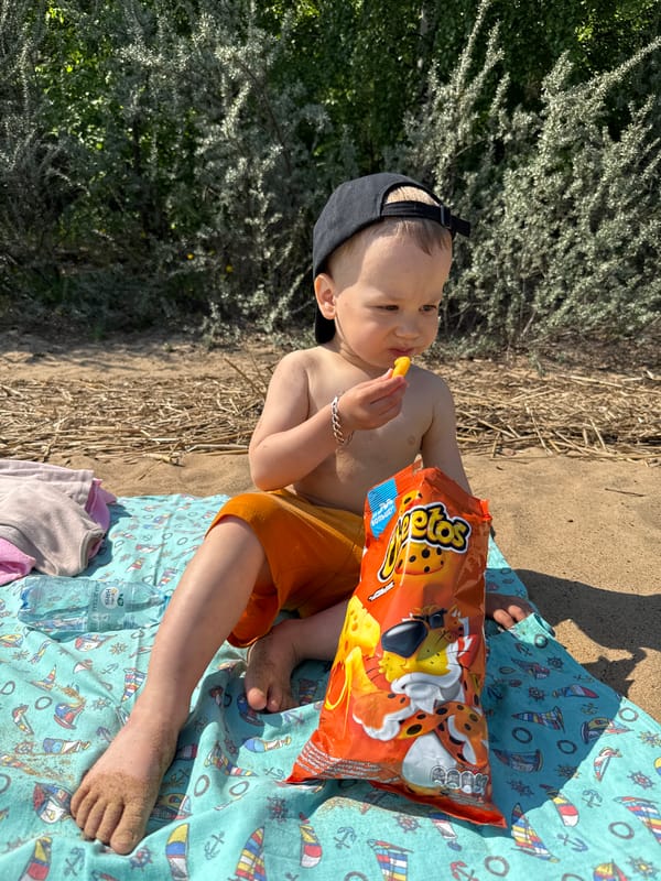 Mother and toddler enjoy beach day in Rusanovo, Russia
