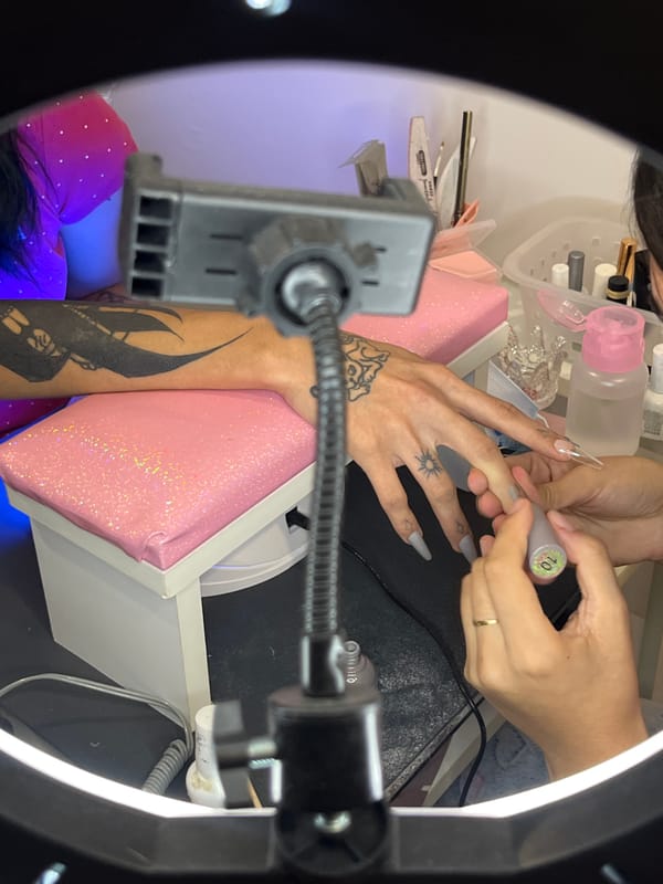 Late night nail salon session documented in Buenos Aires