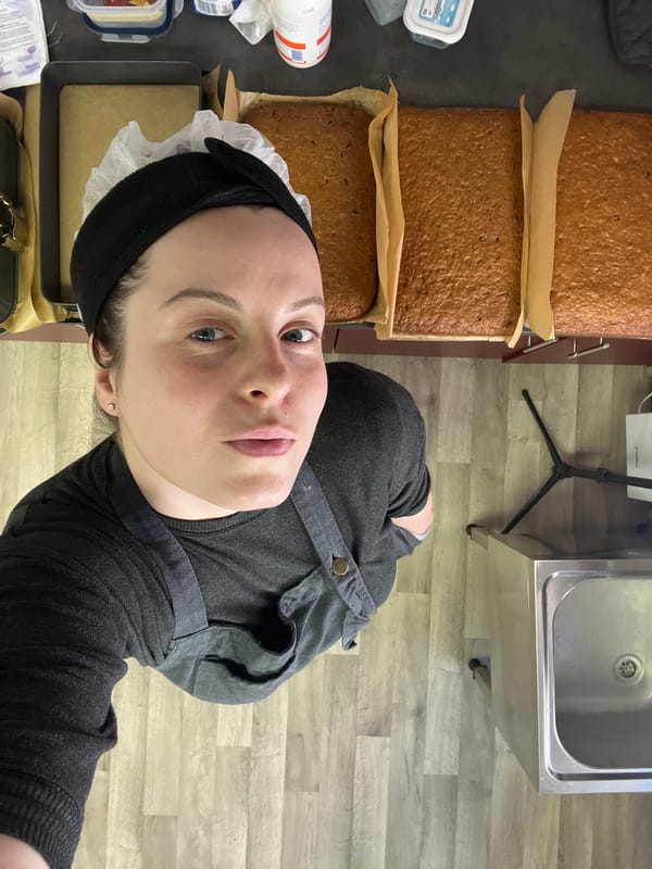 Woman documents commercial baking session in Meisenheim kitchen