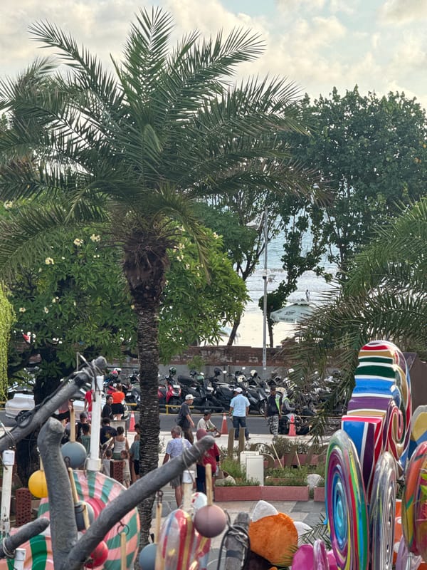 Tourist activities documented during Kuta Beach festival morning