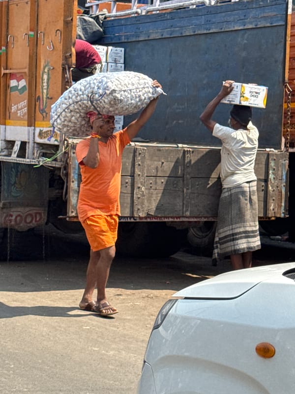 Daily street life documented across Kolkata commercial districts