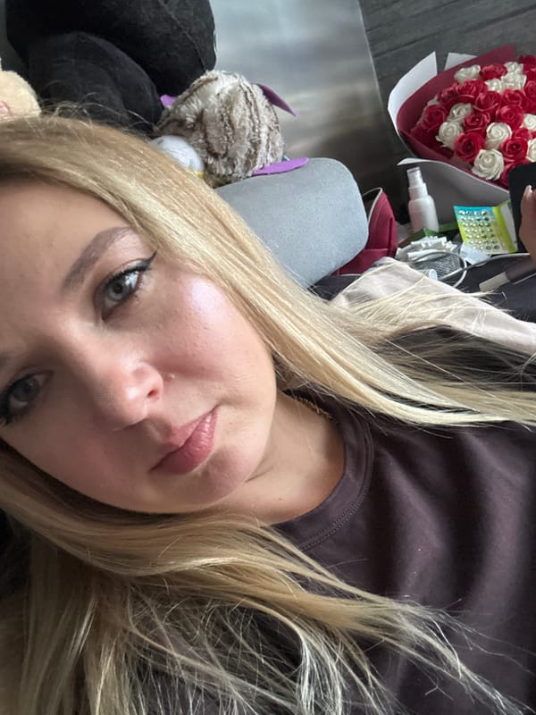 Selfie session from a couch, multiple angles, one sitting.