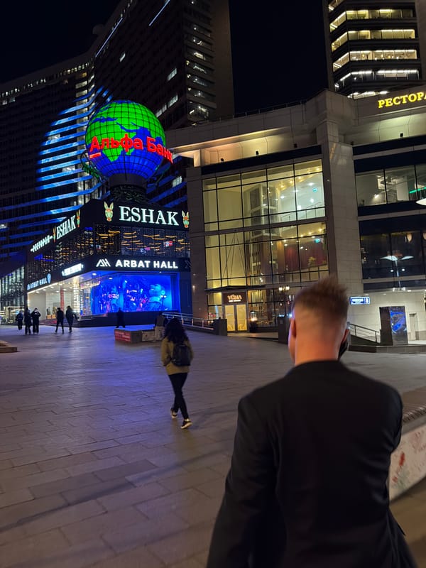 Moscow witness captures urban scenes, Japanese mask, meal over evening hours