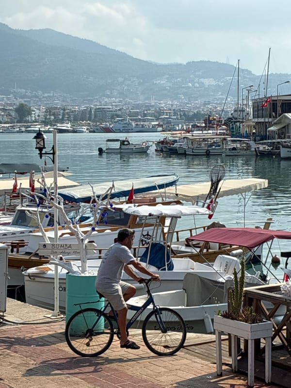 Calm morning at Alanya's marina, boats moored and harbor quiet