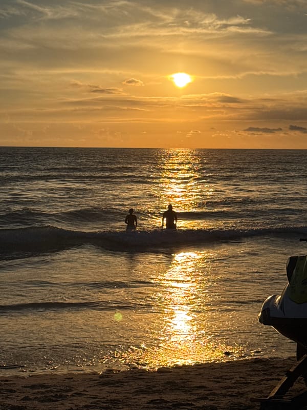 Sunset recreation unfolds at Patong Beach Thailand