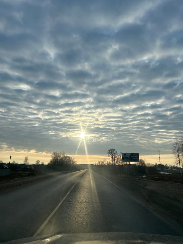 Vehicle travels road in Фоки, Russia early morning
