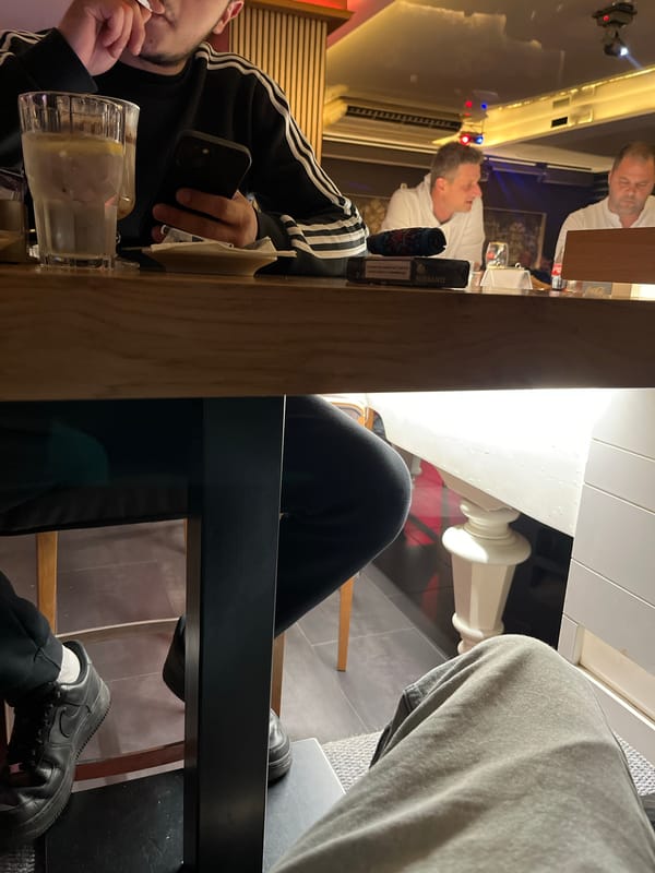 Evening social gathering documented at Karlovo bar