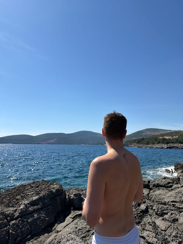Beachgoers enjoy sunny afternoon on Montenegro's Adriatic coastline