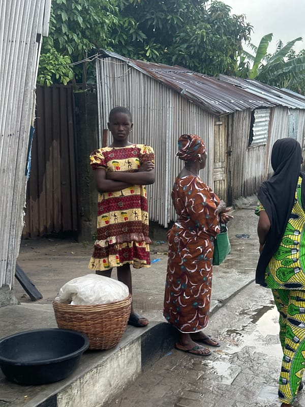 Morning street life in Badagry: school runs, motos, and bread-making