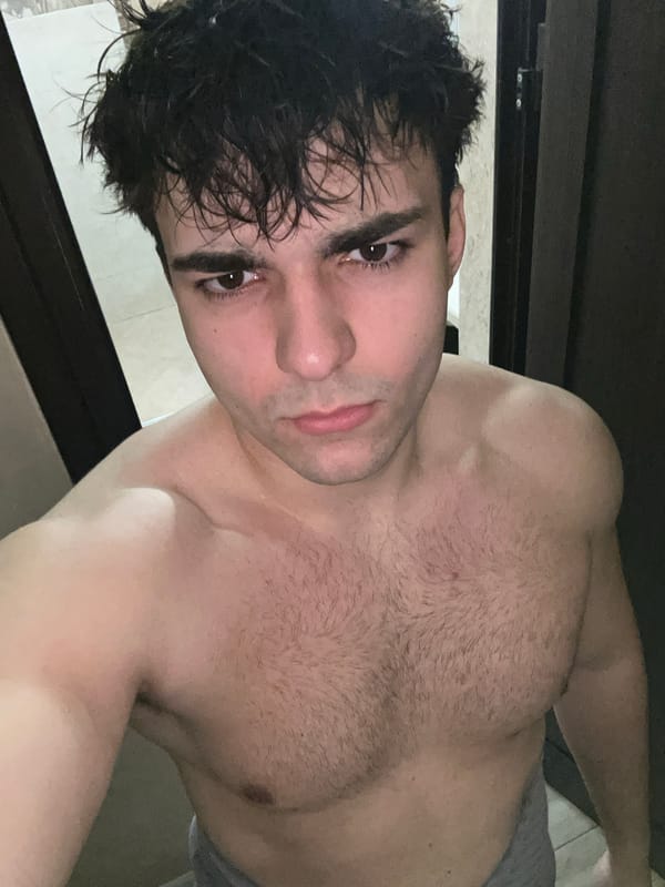 Man documents fitness progress with bathroom mirror selfies
