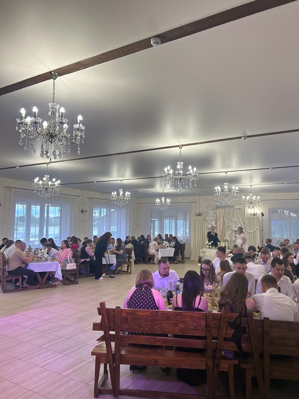 Wedding reception celebrated in Sharkan, Russia with indoor-outdoor festivities