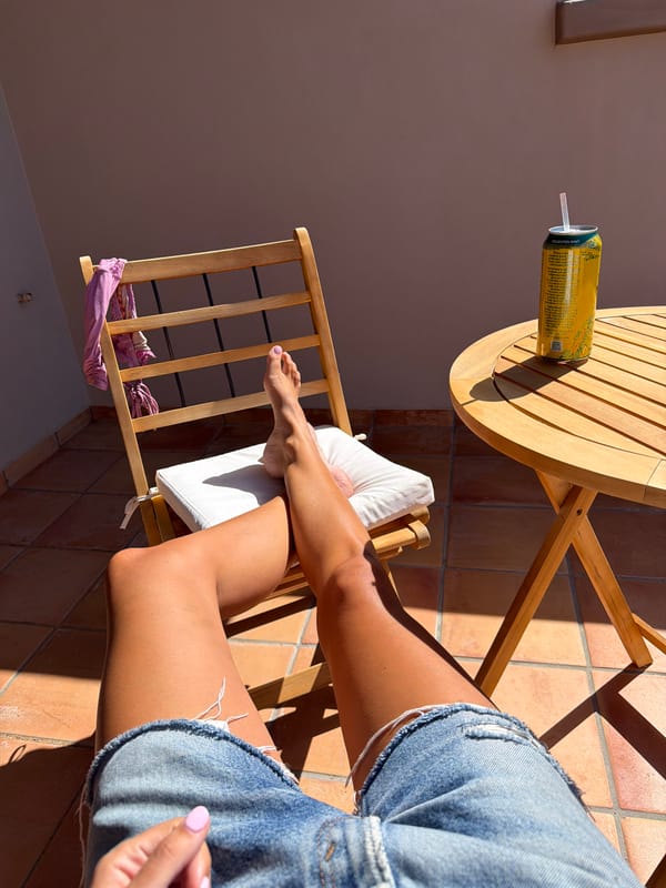 Person relaxes on sunny Malibu patio