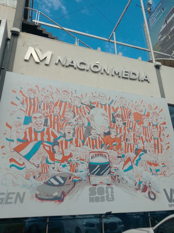 Person documents diverse Asunción landmarks during afternoon walk