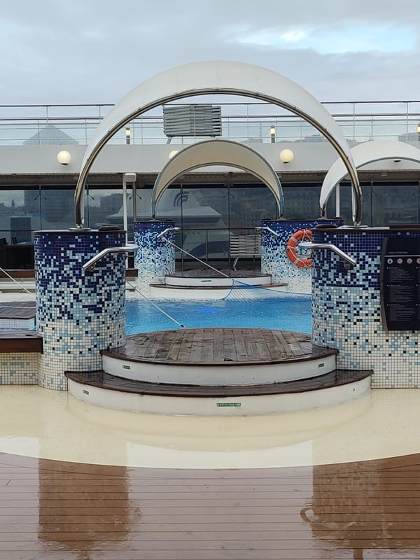 Morning rain scenes captured in Genoa's port and cruise ship