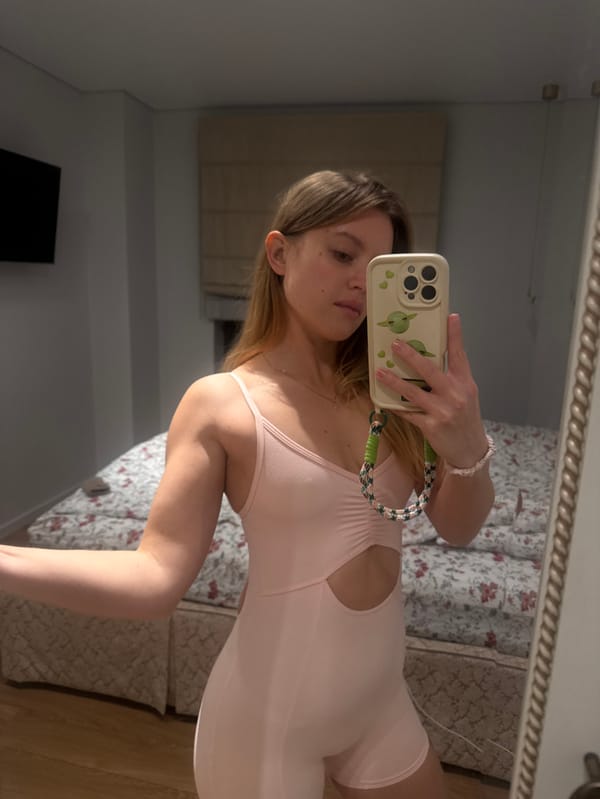 Woman Takes Mirror Selfie with Baby Yoda Phone Case