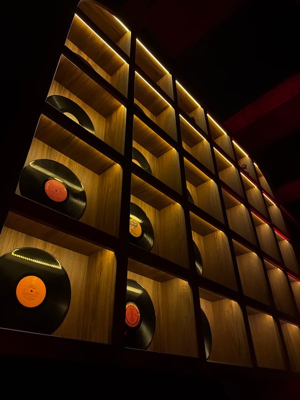 Evening bar scene with vinyl records, cocktails in Yerevan
