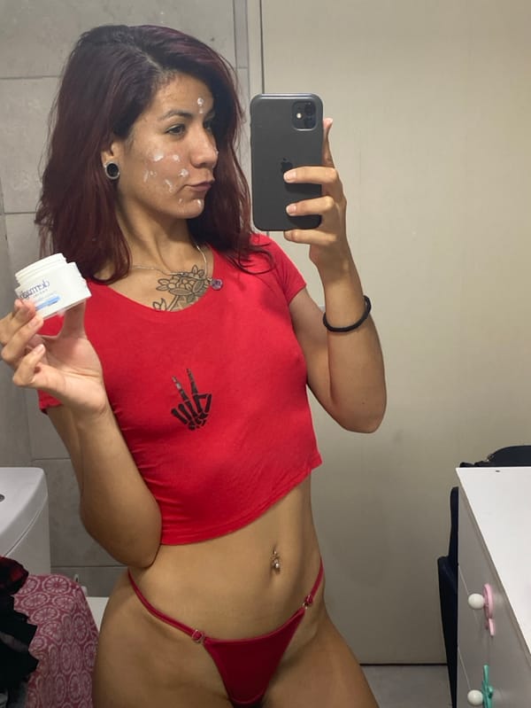 Woman photographed in red clothing in Wilde, Argentina