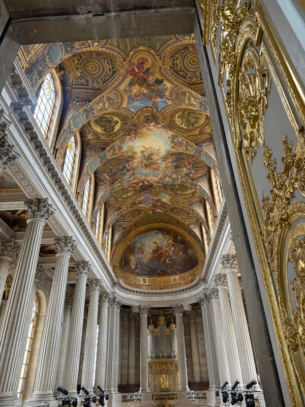 Versailles Palace interior with ornate ceiling documented by visitor