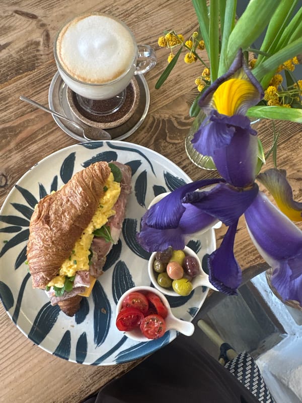 Breakfast croissant served on decorative plate in Bodrum