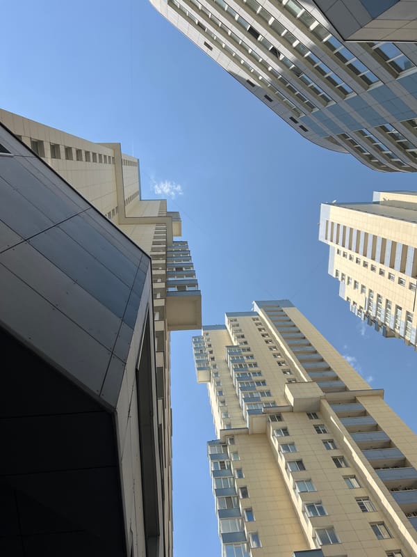Clear skies over modern Moscow buildings captured by witness