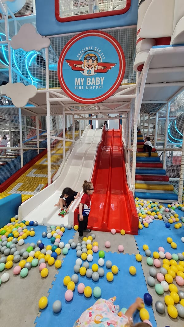 Children play at indoor playground in Al Jizah, Jordan