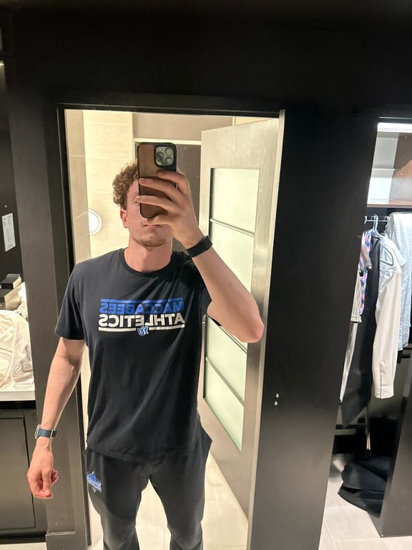 Man photographed in multiple outfits during early morning College Park session