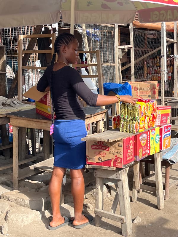 Street vendors conduct morning business at Badagry markets