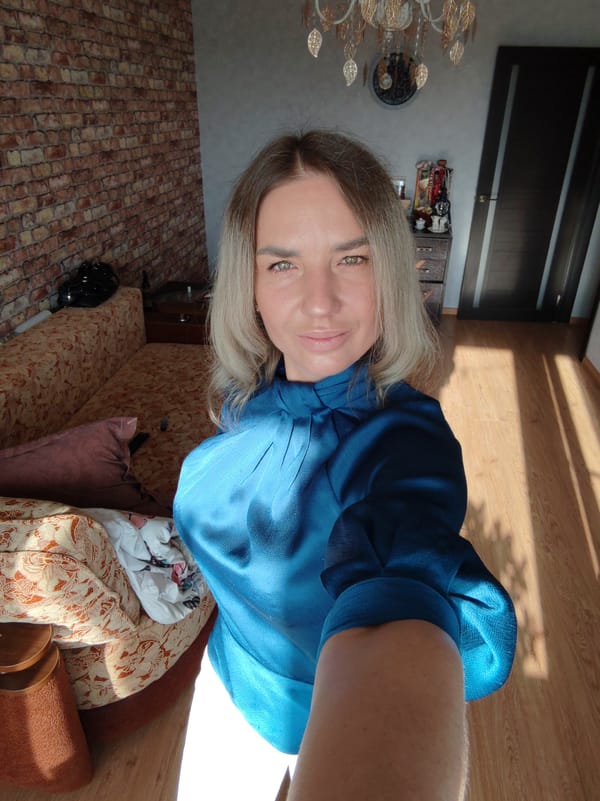 Woman takes selfies at home in Petropavlovsk-Kamchatsky
