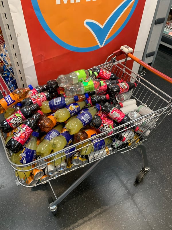 Shopping cart with beverages spotted in London store aisle