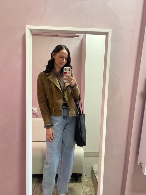 Woman takes mirror selfie in Izhevsk