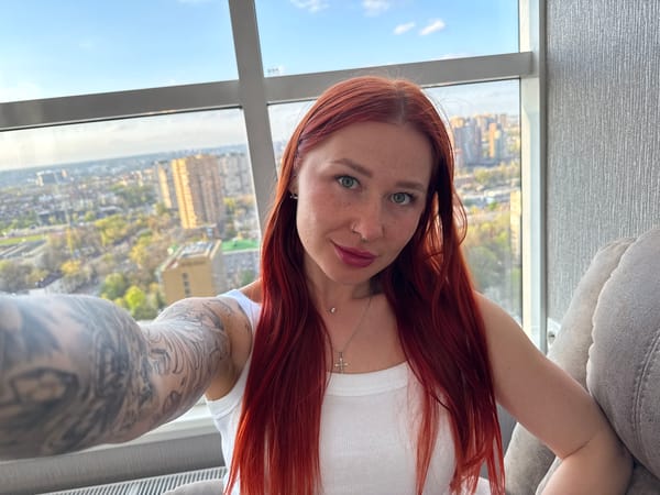 Woman takes selfie by window in Rostov-on-Don