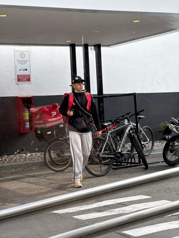Delivery workers gather outside Buenos Aires McDonald's during shift